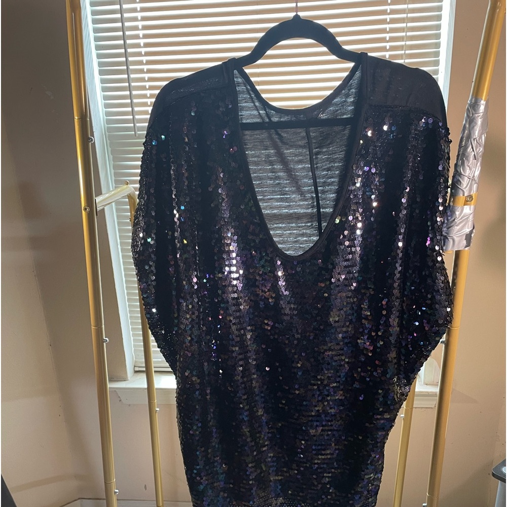 Ladies all over sequence top, accept on the back.